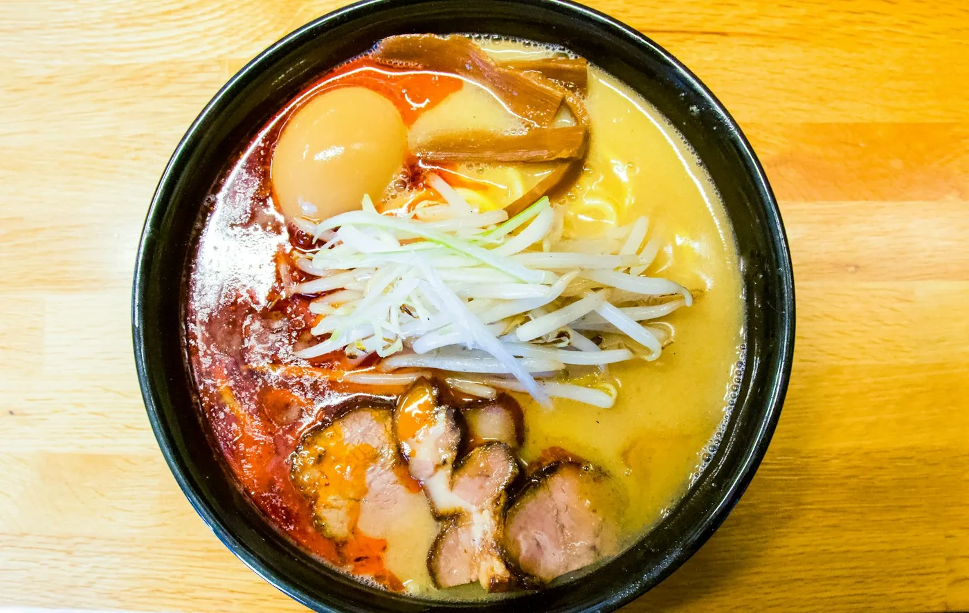 Red cloud ramen with chili oil, bean sprouts, chashu and a soft egg