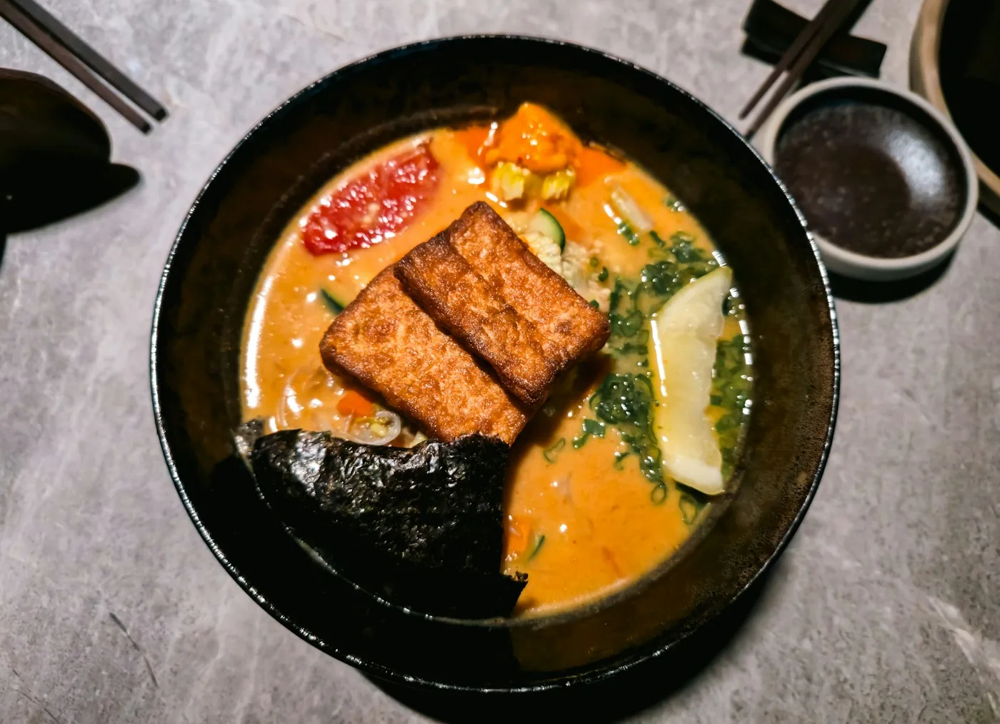Vegan miso ramen with seared tofu, nori and greens