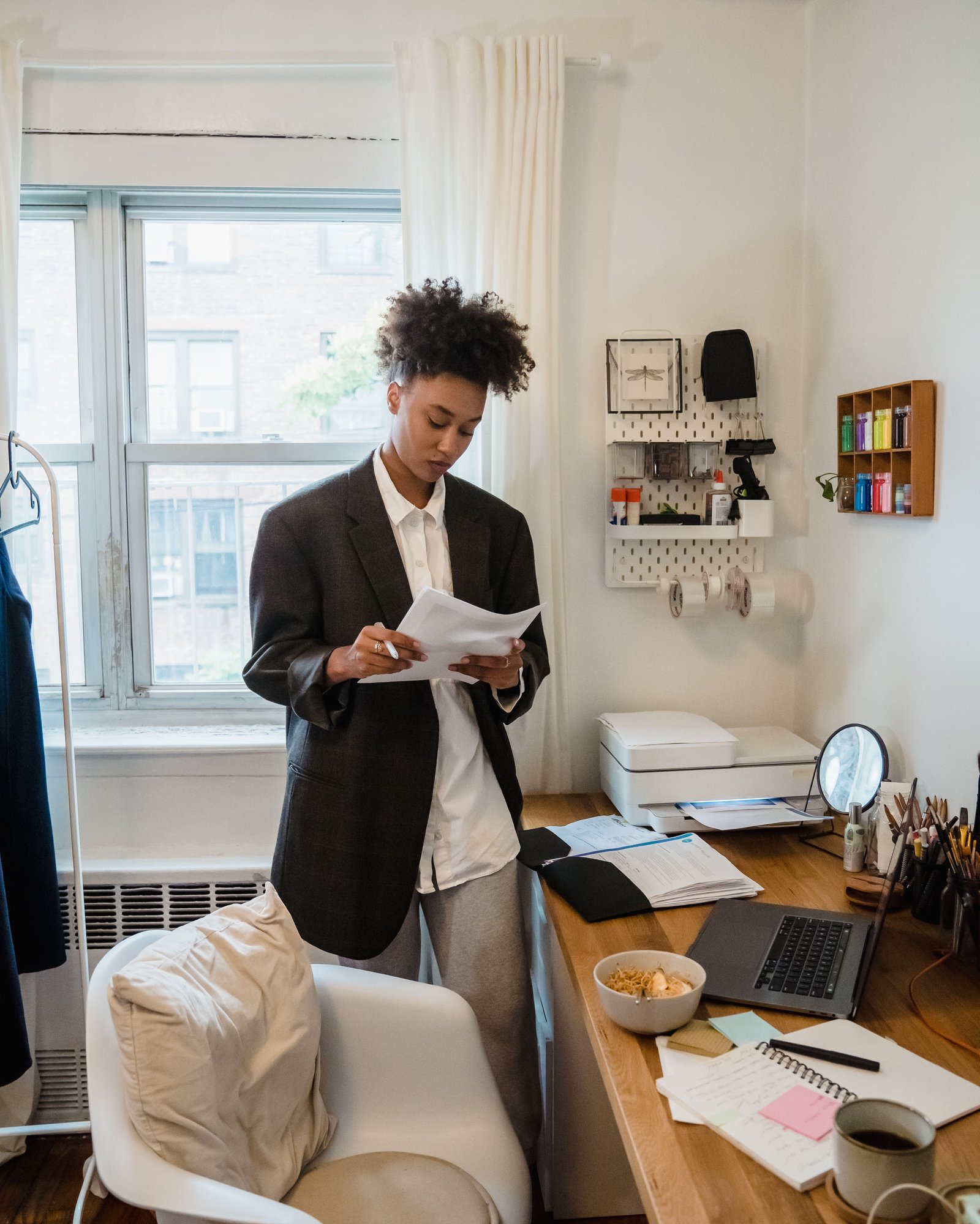 A person reading and organizing important documents