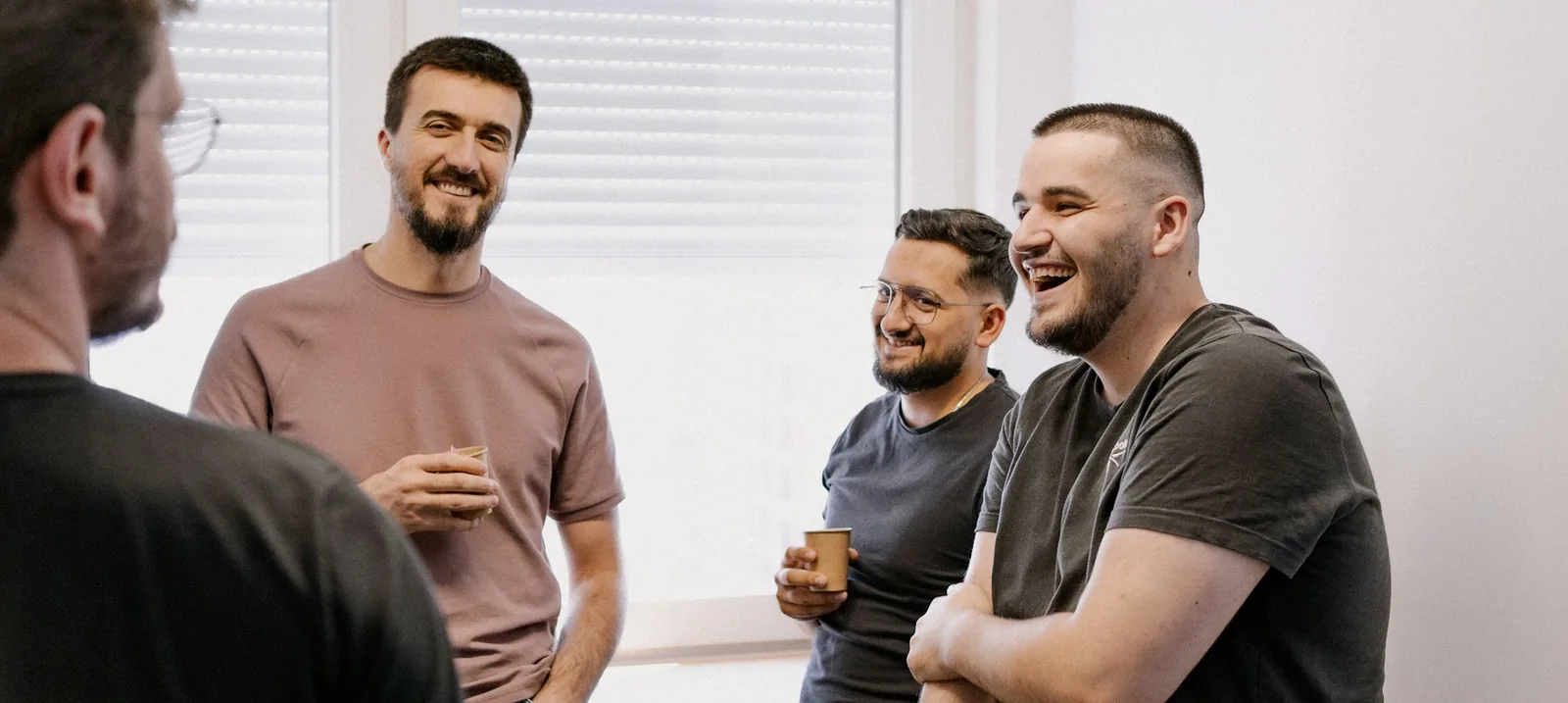 Fieldnote's team laughing with a founder after an investor rehearsal